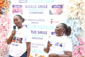 Angella, one of the beneficiaries of free cleft lip and palate surgery, sharing her treatment journey and testimony during the World Smile Day celebrations at St. Joseph’s Hospital Wakiso.