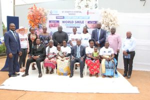 Dr. Nicholas Mugagga, Owek. Israel Kitooke Kazibwe, Linda Audrey, Dr. Richard Kabanda and other dignitaries with a few cleft lip & palate patients at St. Joseph's hospital Wakiso.