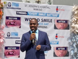 Dr. Mugagga Nicholas, addressing guests during the World Smile Day celebrations at St. Joseph’s Hospital Wakiso.